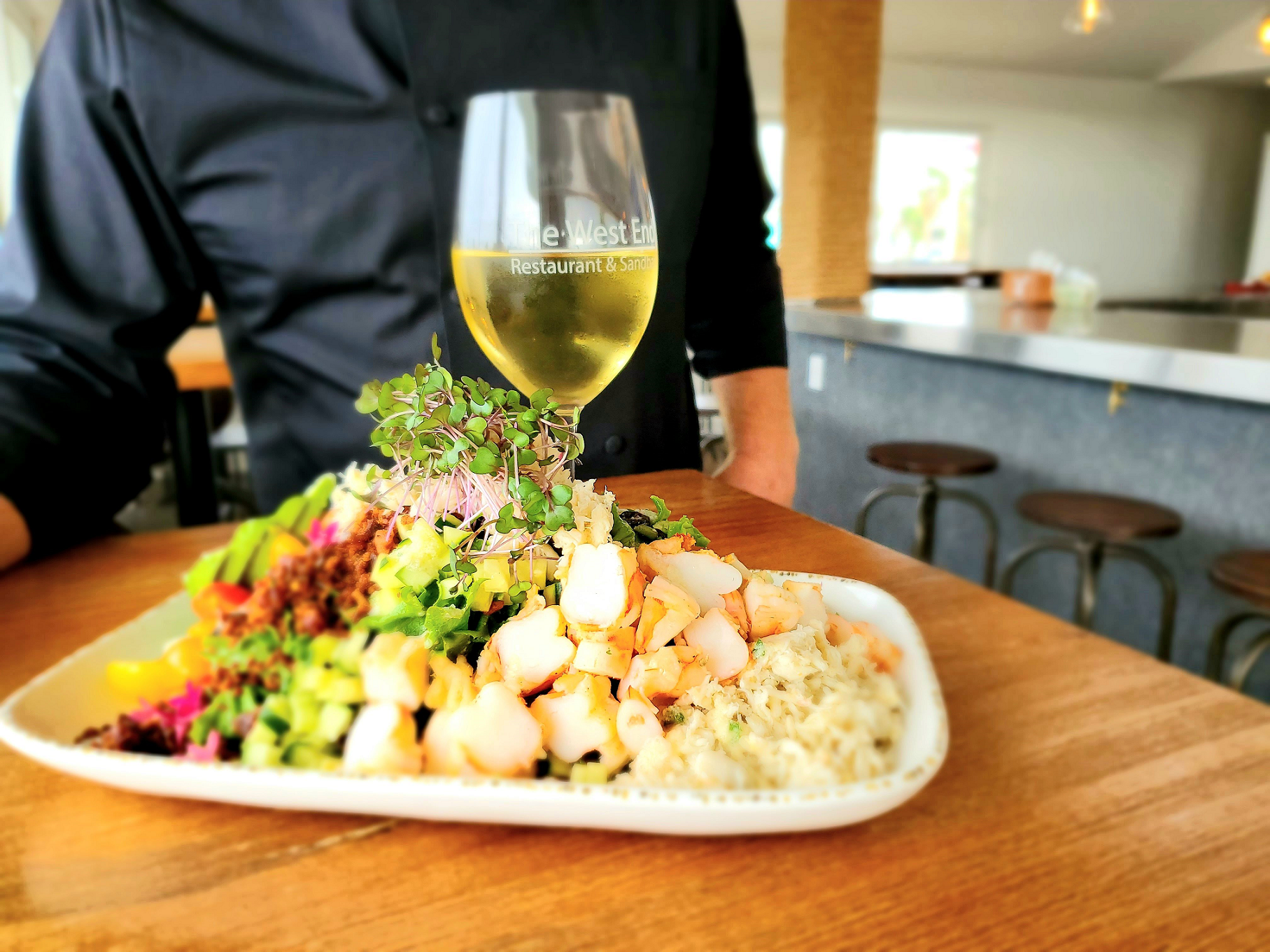chef aldis west end marina and restaurants cobb salad and chardonnay